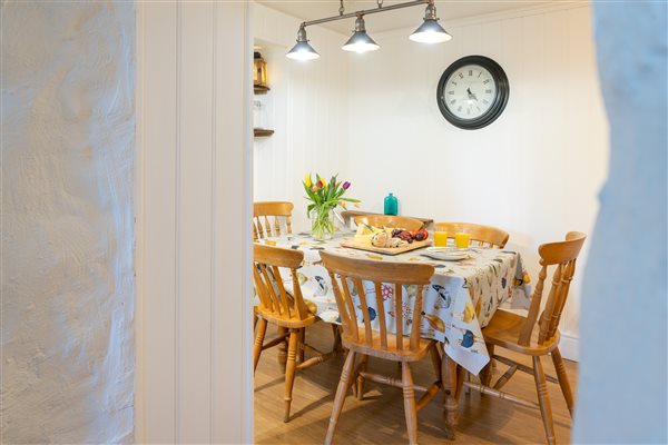 Peeping through to the dining table in The Farmhouse